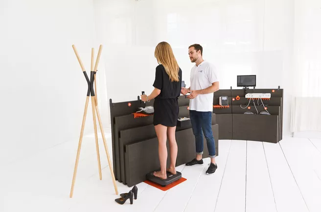 A picture of two persons in a Health Care Center