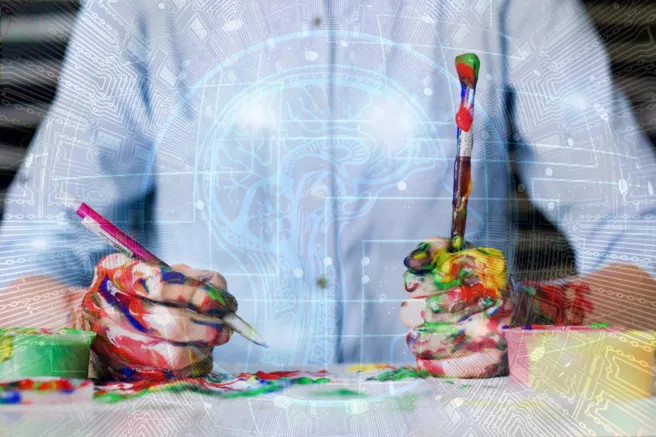 A picture of a person holding painting tools